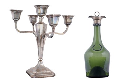 Lot 59 - A George V silver candelabrum; and a Scottish silver mounted, dark green glass bottle
