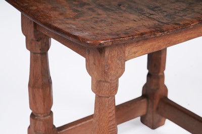 Lot 453 - Robert ‘Mouseman’ Thompson: an oak dish top stool