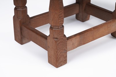 Lot 453 - Robert ‘Mouseman’ Thompson: an oak dish top stool