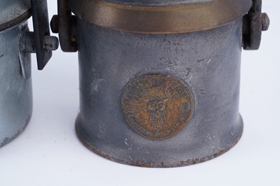 Lot 231 - A collection of six early 20th Century carbide lamps