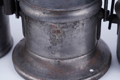 Lot 231 - A collection of six early 20th Century carbide lamps