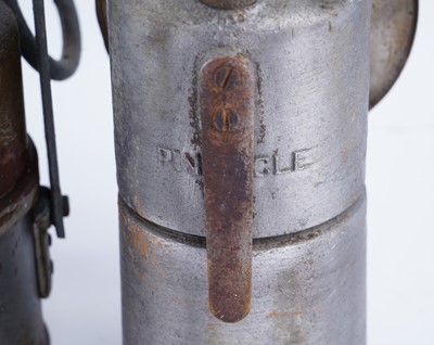 Lot 219 - A collection of six early 20th Century carbide lamps
