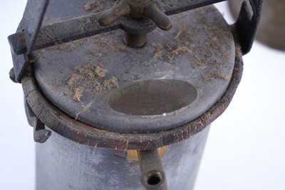 Lot 219 - A collection of six early 20th Century carbide lamps