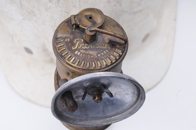 Lot 159 - Three helmets; and a collection of electric lights