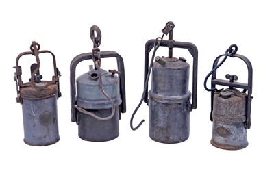 Lot 190 - A collection of nine early 20th Century carbide lamps