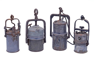 Lot 190 - A collection of nine early 20th Century carbide lamps