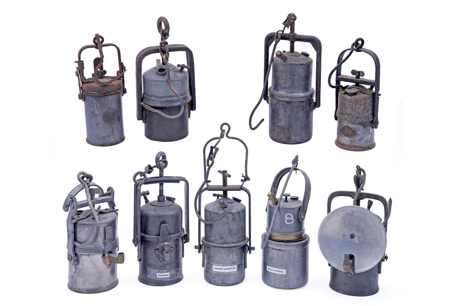 Lot 190 - A collection of nine early 20th Century carbide lamps
