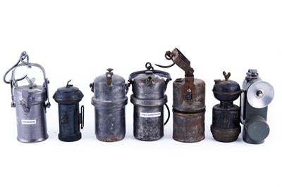 Lot 188 - A collection of seven carbide lamps