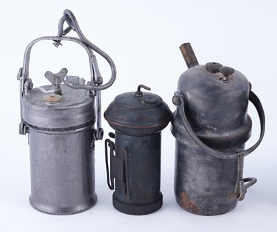 Lot 188 - A collection of seven carbide lamps