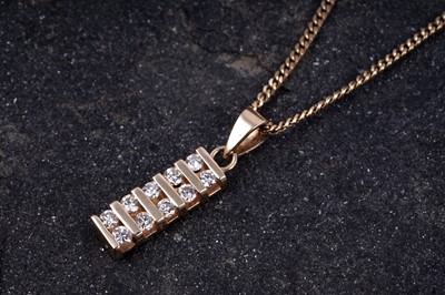 Lot 520 - A diamond pendant on chain