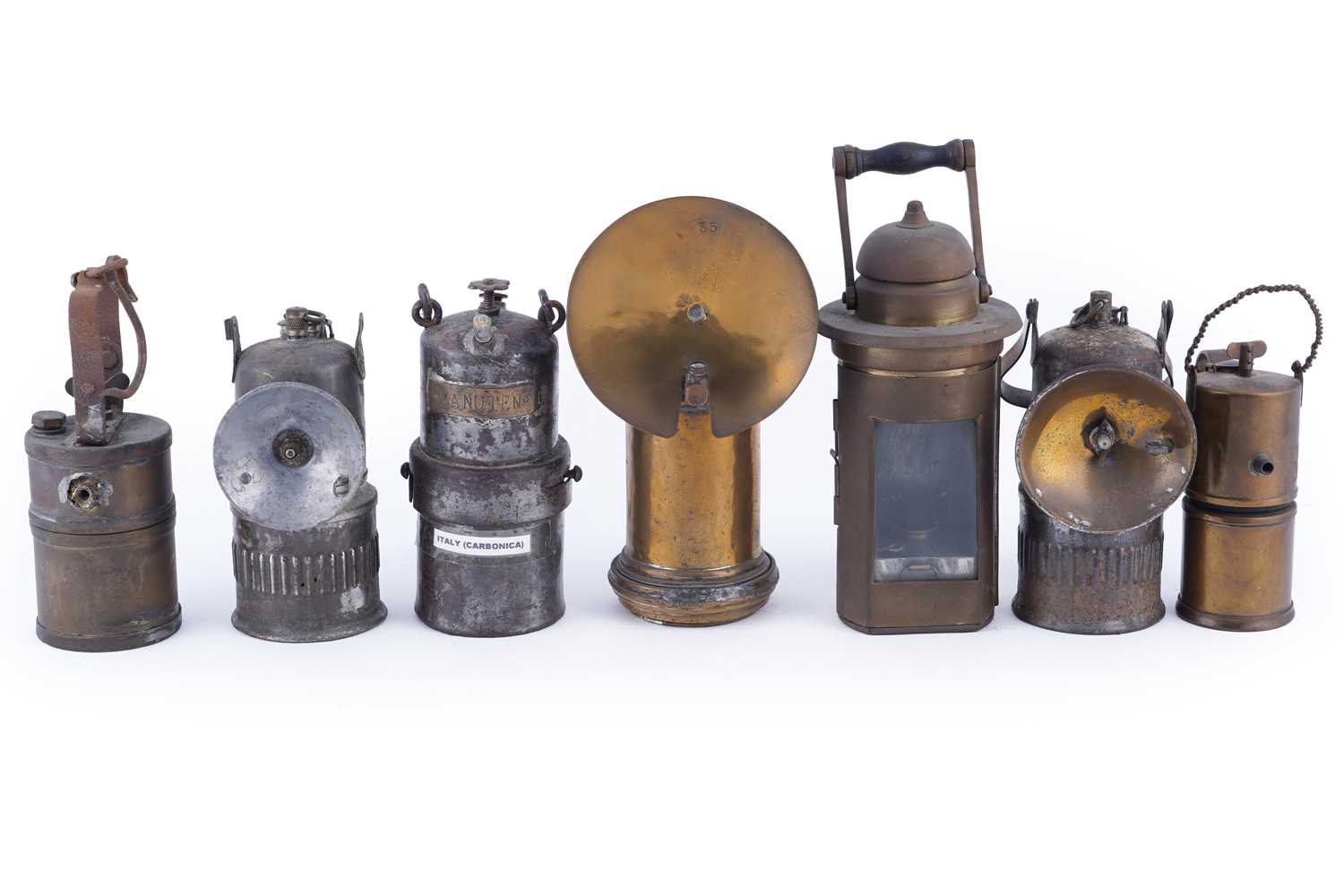 Lot 172 - A collection of seven carbide lamps