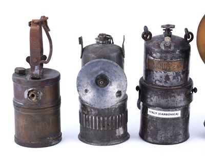 Lot 172 - A collection of seven carbide lamps