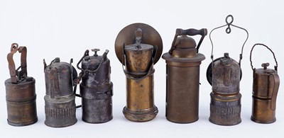 Lot 172 - A collection of seven carbide lamps