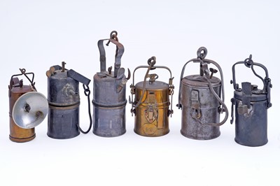 Lot 240 - A collection of six carbide lamps