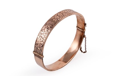 Lot 363 - An Edwardian 9ct rose gold bangle