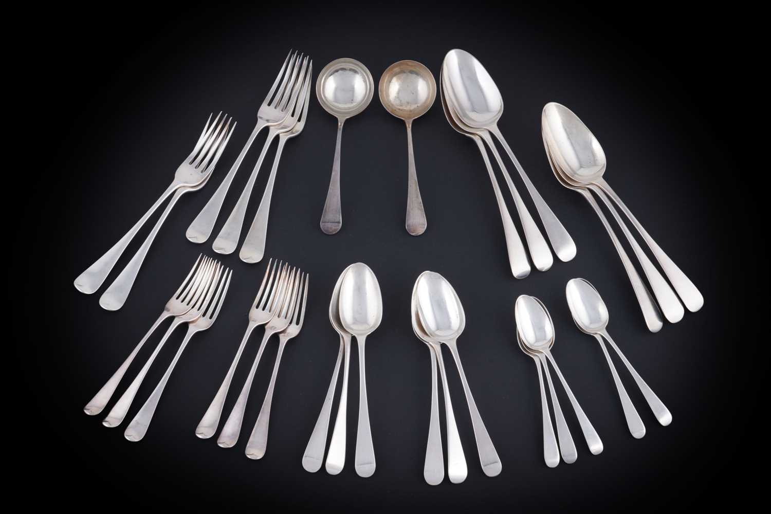 Lot 214 - A William IV silver part service of Old English pattern flatware