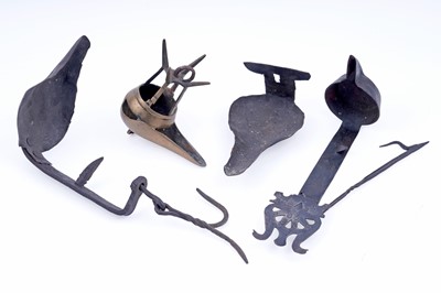 Lot 239 - Three 18/19th Century wrought iron ‘Betty’ lamps; and one brass