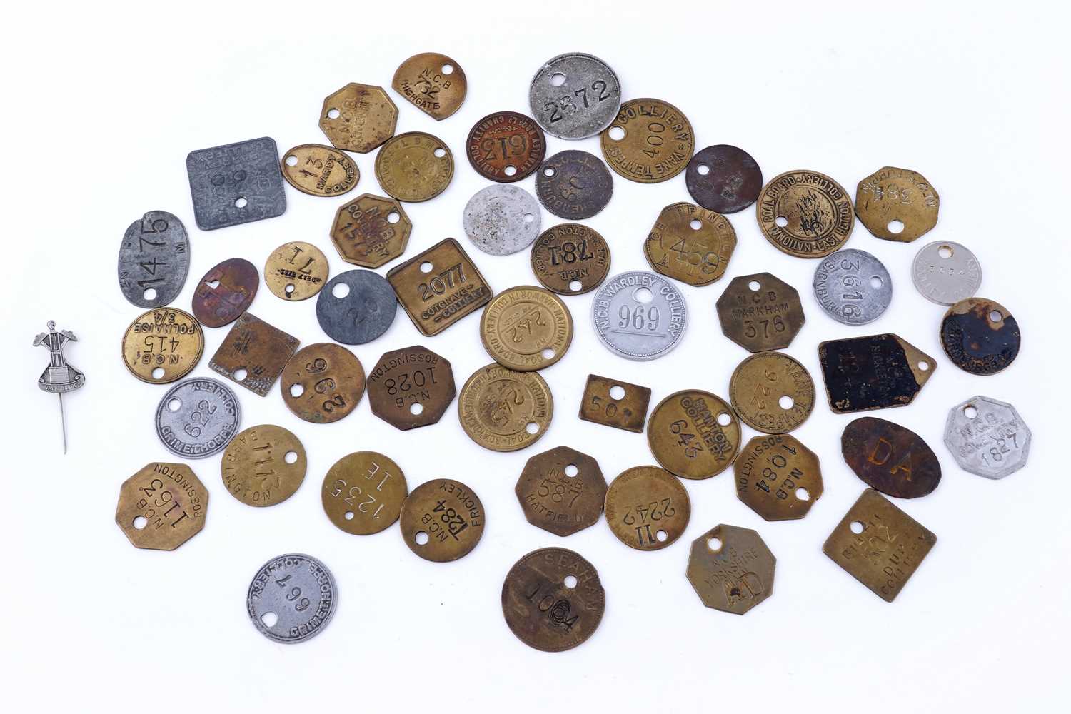 Lot 235 - A collection of pit tally tokens or checks