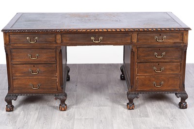 Lot 91 - An early 20th Century mahogany partner’s desk
