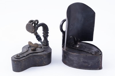 Lot A 19th Century wrought iron ‘Betty’ type lamp; and a 'Frog' type lamp