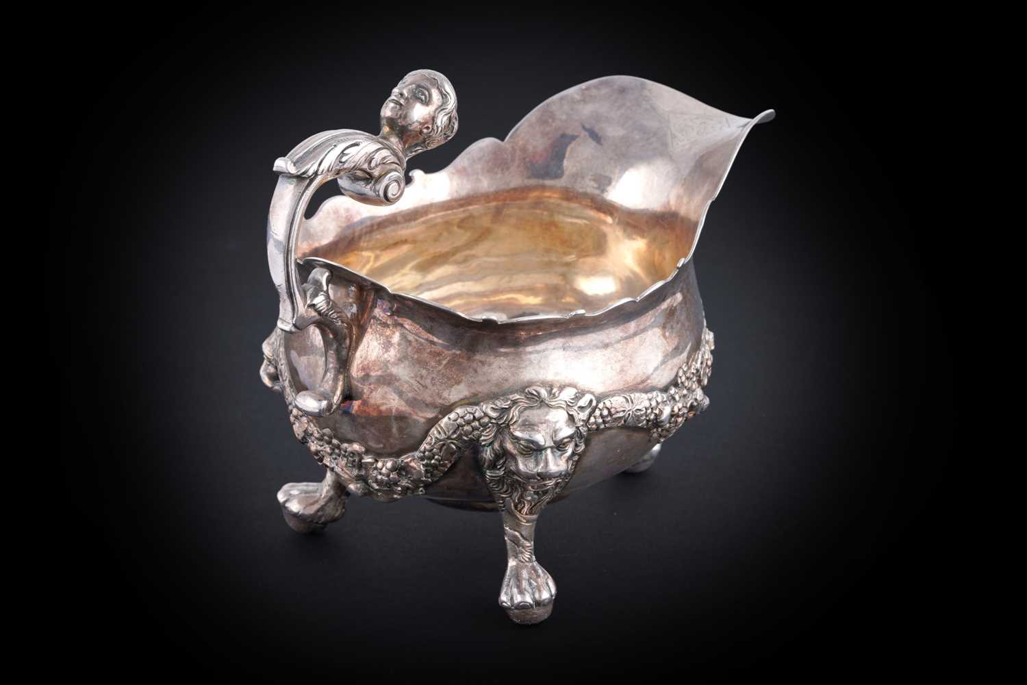 Lot 57 - A late George II small silver sauceboat