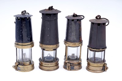 Lot 233 - Four ‘Protector’ type miners’ lamps