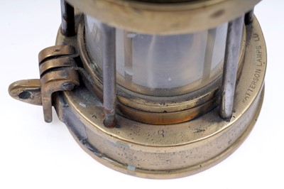 Lot 233 - Four ‘Protector’ type miners’ lamps