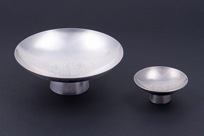 Lot 258 - A Japanese silver sake cup; and one other
