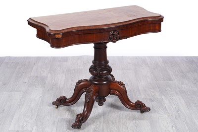 Lot 83 - A Victorian mahogany fold-over card table