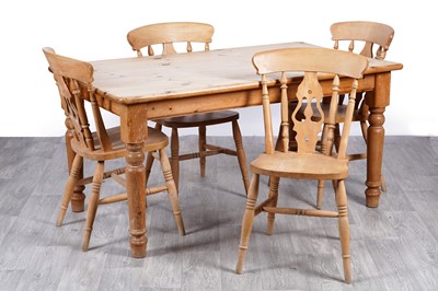 Lot 100 - A pine table and farmhouse chairs