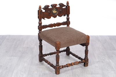 Lot 1 - A 17th Century and later continental walnut low chair