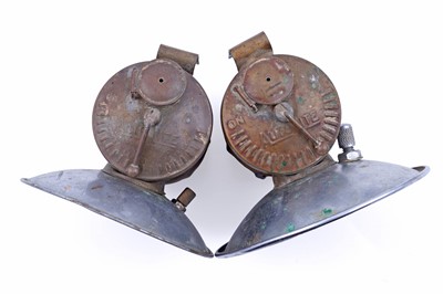Lot 243 - A collection of brass ‘Guys Dropper’ type carbide lamps