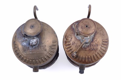 Lot 243 - A collection of brass ‘Guys Dropper’ type carbide lamps