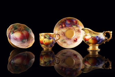 Lot 400 - A Royal Worcester fruit-painted coffee cup and saucer, milk jug and sugar bowl