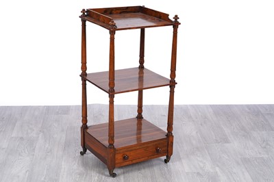 Lot 49 - A Victorian rosewood three-tier whatnot