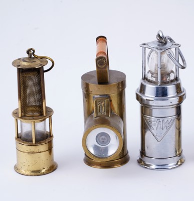 Lot 169 - A collection of miniature brass model lamps