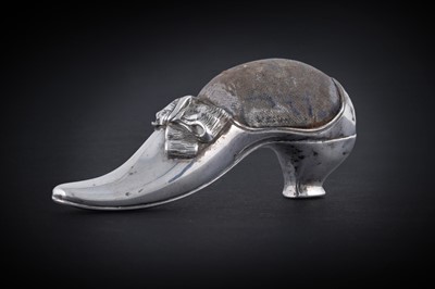 Lot 546 - A Victorian silver novelty pin cushion in the form of a lady's slipper
