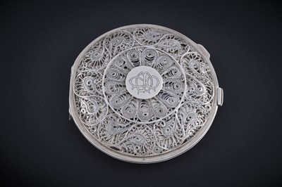 Lot 298 - A late 19th/early 20th Century Iraqi silver powder compact