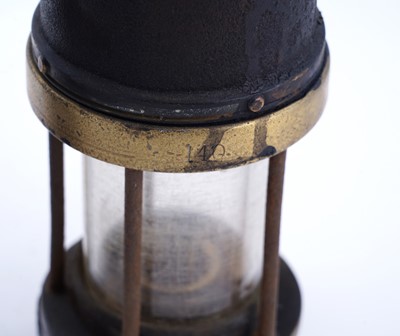 Lot 185 - A collection of four ‘Protector’ type lamps