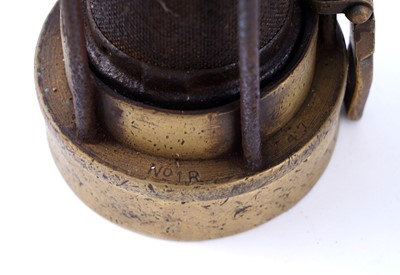 Lot 185 - A collection of four ‘Protector’ type lamps