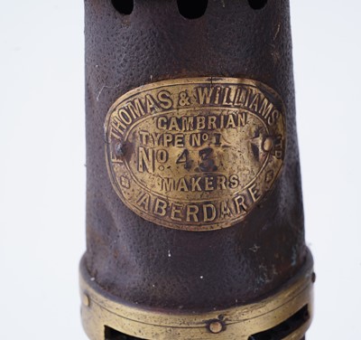 Lot 185 - A collection of four ‘Protector’ type lamps