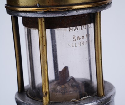 Lot 185 - A collection of four ‘Protector’ type lamps