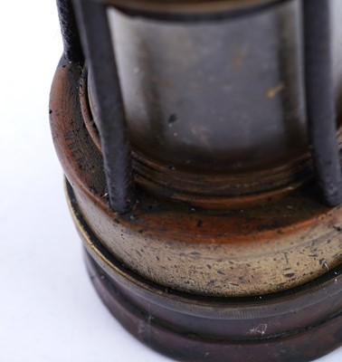 Lot 185 - A collection of four ‘Protector’ type lamps