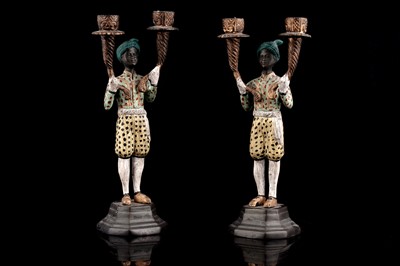 Lot 174 - A pair of reproduction Blackamore candelabra