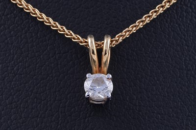 Lot 443 - A contemporary solitaire diamond pendant on chain