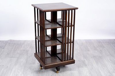 Lot 70 - An Edwardian oak revolving bookcase