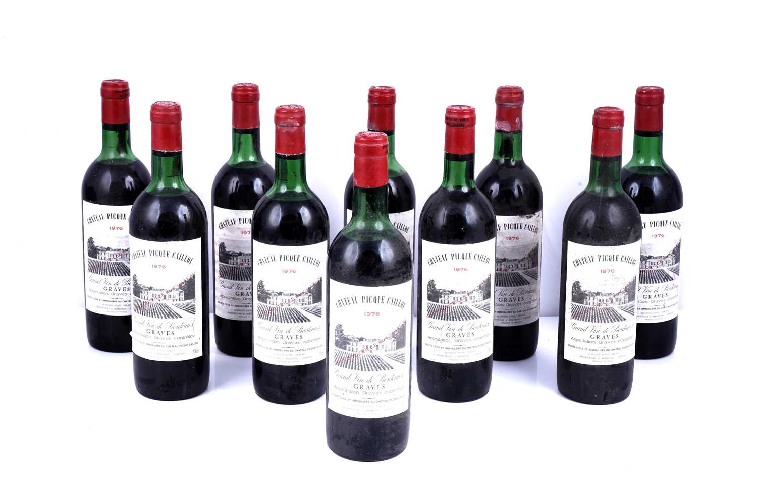 Lot 600 - Ten bottles of Château Picque Caillou 1976 Graves Grand Vin de Bordeaux