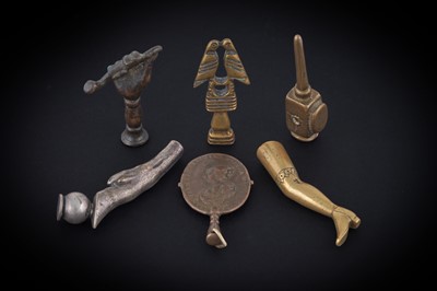 Lot 322 - A small group of six antique pipe tampers