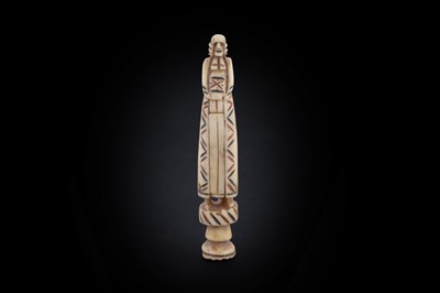 Lot 324 - An early 19th Century anti-clerical novelty carved bone pipe tamper