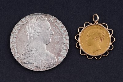 Lot 326 - A Maria Theresa silver thaler; and a Victorian gold sovereign